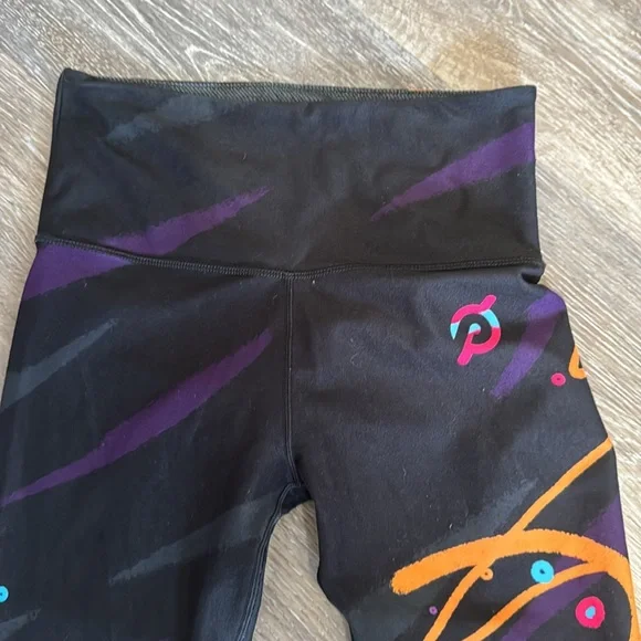 Peloton X Hust Wilson black orange purple 80s print reversible grey leggings M - Picture 3 of 7